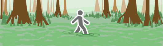 Un escursionista che si muove attraverso una palude, che lo rallenta